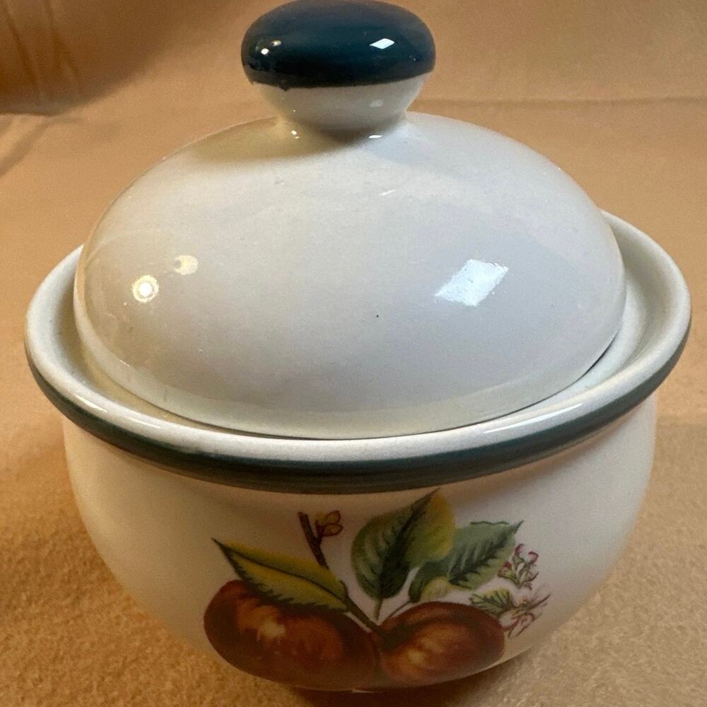 China Pearl Casuals sugar bowl w/lid featuring a red apples & blossoms pattern